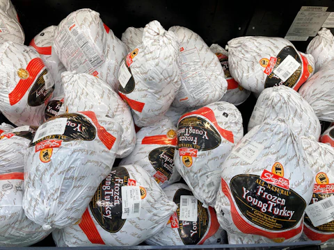 File - Frozen turkeys are displayed at a supermarket in Philadelphia, Wednesday, Nov. 17, 2021. Americans are bracing for a costly Thanksgiving this year, with double-digit percent increases in the price of turkey, potatoes, stuffing, canned pumpkin and other staples.(AP Photo/Matt Rourke, File)