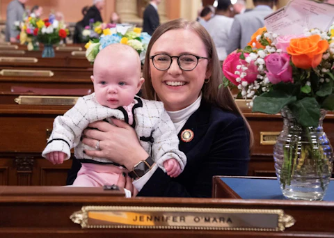 State Rep. Jen O’ Mara with her daughter, photographed at the Pennsylvania House swearing-in ceremony in Harrisburg, Jan. 6, 2023. (Photo: Pennsylvania House of Representatives).