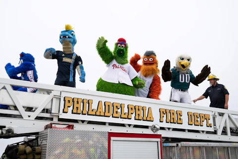 Mascots from professional Philadelphia sports teams cross over the repaired section of Interstate 95 as the highway is reopened Friday, June 23, 2023 in Philadelphia.  Workers put the finishing touches on an interim six-lane roadway that will serve motorists during construction of a permanent bridge. (AP Photo/Joe Lamberti)