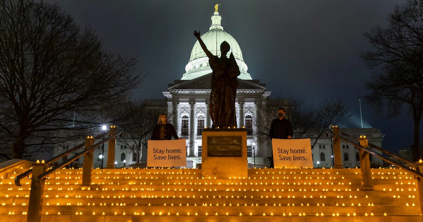 Healthcare workers lit candles in recognition of COVID-19 patients in Wisconsin.