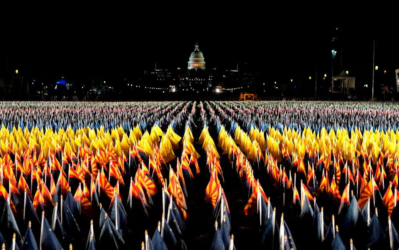 The "Field of Flags" is pictured on the National Mall as the US Capitol Building is prepared for the inauguration ceremonies for President-elect Joe Biden and Vice President-elect Kamala Harris on January 18, 2021 in Washington, DC. - President-elect Joe Biden and Vice President-elect Kamala Harris will be sworn into office January 20, 2021.