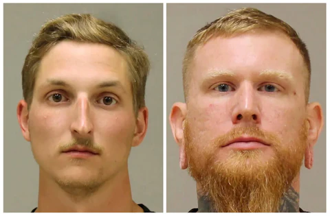This photo combo of images provided by the Kent County Sheriff shows Daniel Harris, left, and Brandon Caserta in booking photos. On Friday, April 8, 2022, jurors acquitted Harris and Caserta of all charges in a plot to kidnap Michigan Gov. Gretchen Whitmer, but couldn’t reach verdicts against the two alleged leaders. In addition, Harris was acquitted of charges related to explosives and a gun. (Kent County Sheriff via AP, File)