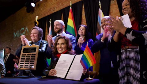 Gov. Gretchen Whitmer signs an expansion of the Elliott-Larsen Civil Rights Act into law in March. (Governor Gretchen Whitmer via Facebook)