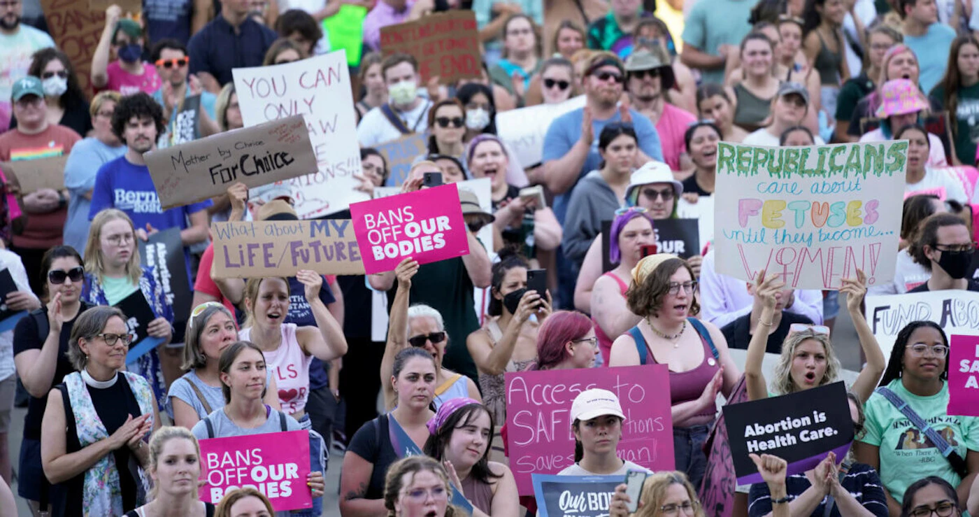 Abortion rights protesters attend a rally outside the state Capitol in Lansing in 2022. (AP Photo/Paul Sancya, File)