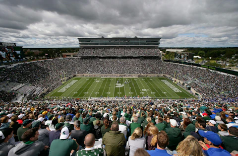 FILE - Michigan State and Air Force play an NCAA college football game, Saturday, Sept. 19, 2015, in Spartan Stadium in East Lansing, Mich. Michigan State University plans to sell alcohol at select home football games in the 2023 season following a recent change to state law that permits liquor licenses to be issued to sporting venues at public universities. (AP Photo/Al Goldis, File)